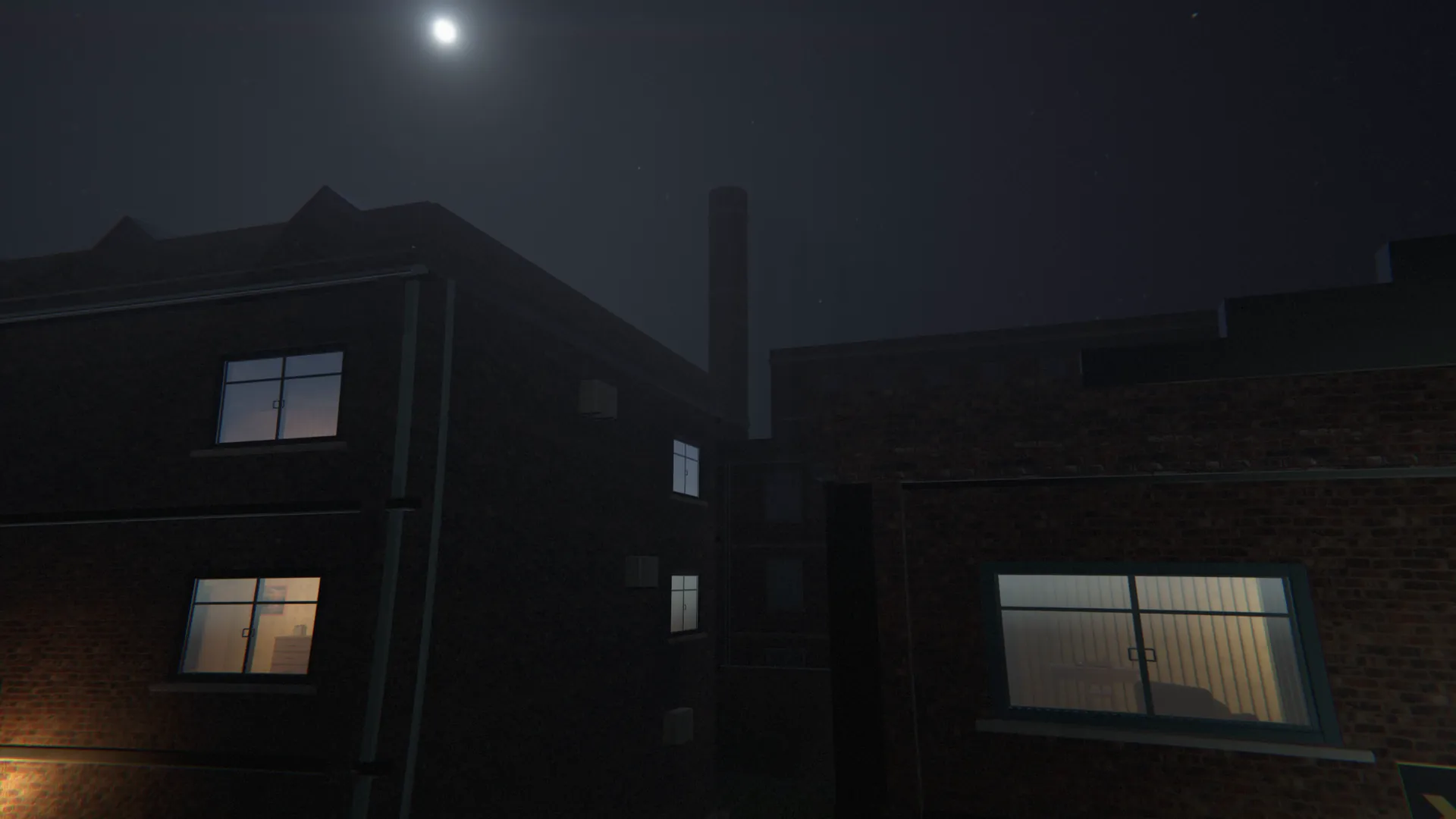 Night over the district, looking up past lit windows to a factory chimney and the moon.