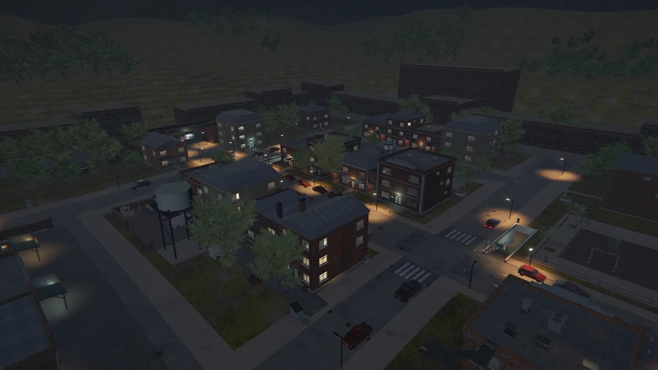 The district at night from above, with the water tower on the left.