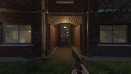 A brick archway leading into a narrow lamp-lit passage, pistol drawn in the foreground.